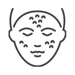 Icon of a face with sunspots for removal treatment