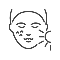 Icon depicting a human face with sun damage effects