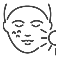 Outlined image of a face with blemishes on the left cheek, under a sun icon, suggesting a skincare issue or sensitivity to sunlight.